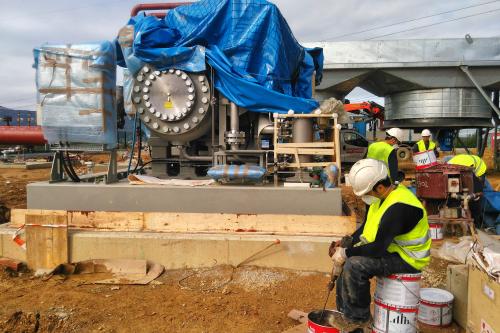 Grouting of a reciprocating compressor